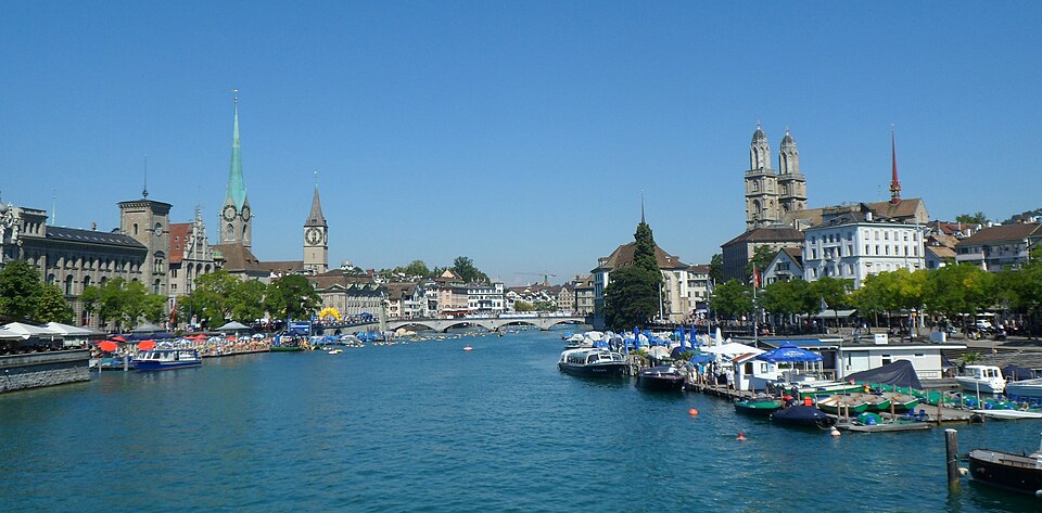 Zürich’s waterfront and church towers along the Limmat river.
